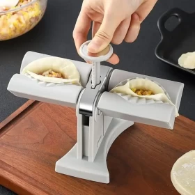 Double headed dumpling maker